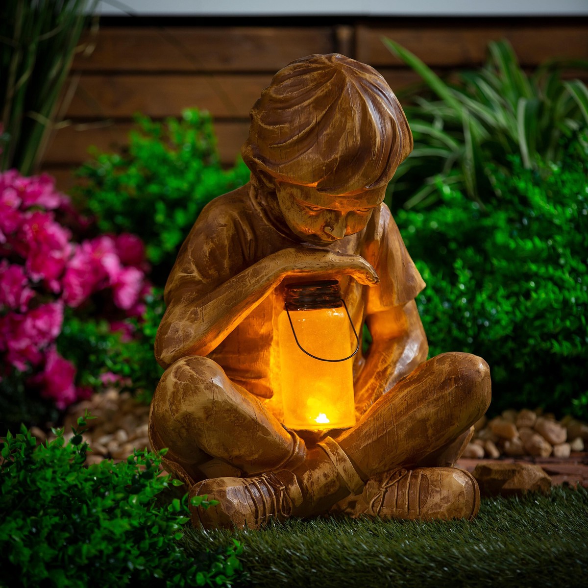 Boy With Firefly Statue